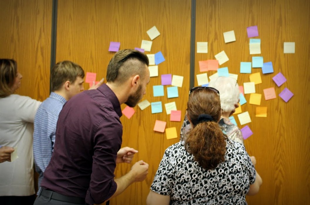 Participants collaborating in a problem-solving workshop